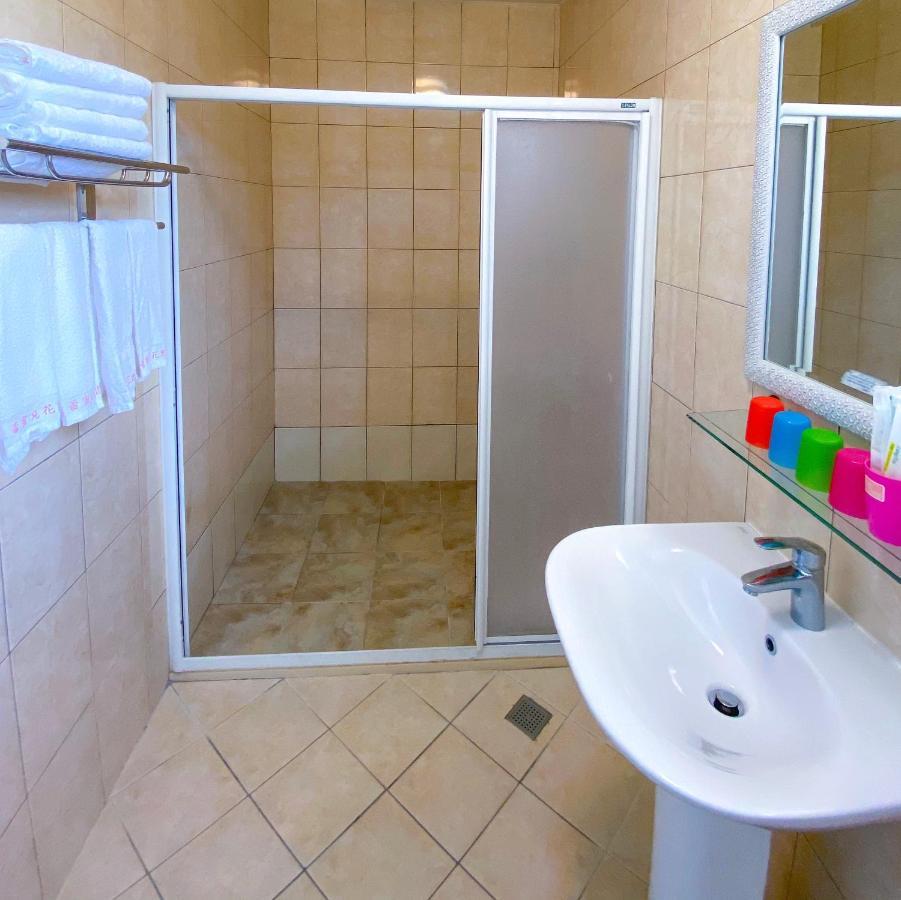 Lei Mi Er Hua Yuan Min Su Apartamento Pinghe Exterior foto